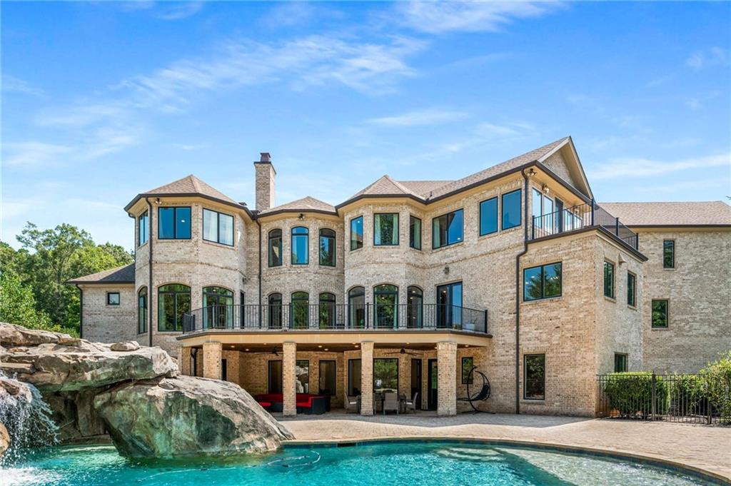 2340 Thisel Down Drive Statham, GA 30666 - Photo 95 of 105 a front view of a residential apartment building with a yard