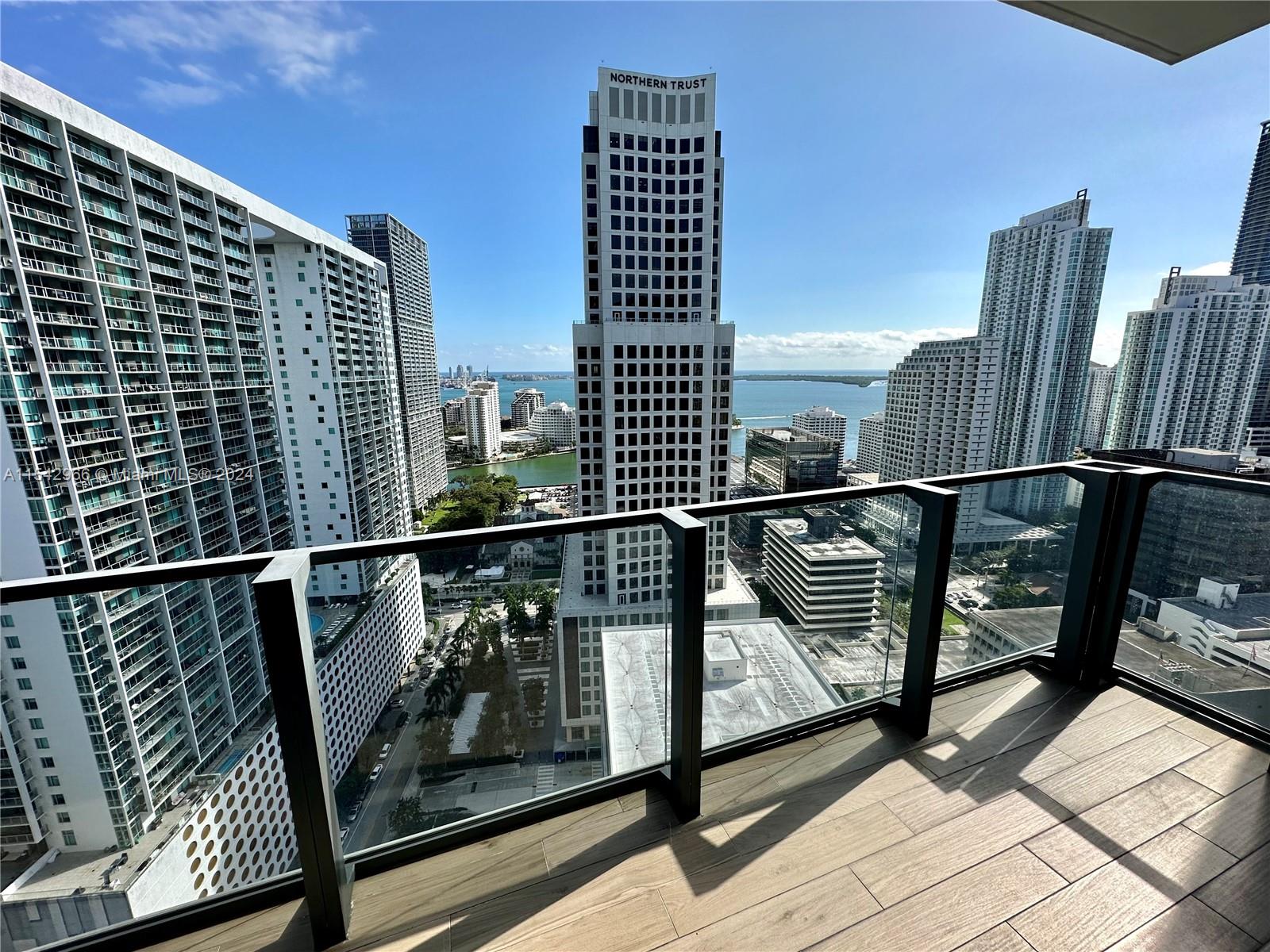 68 Southeast 6th Street, Unit 2707 Miami, FL 33131 - Photo 2 of 53 a view of balcony with wooden floor