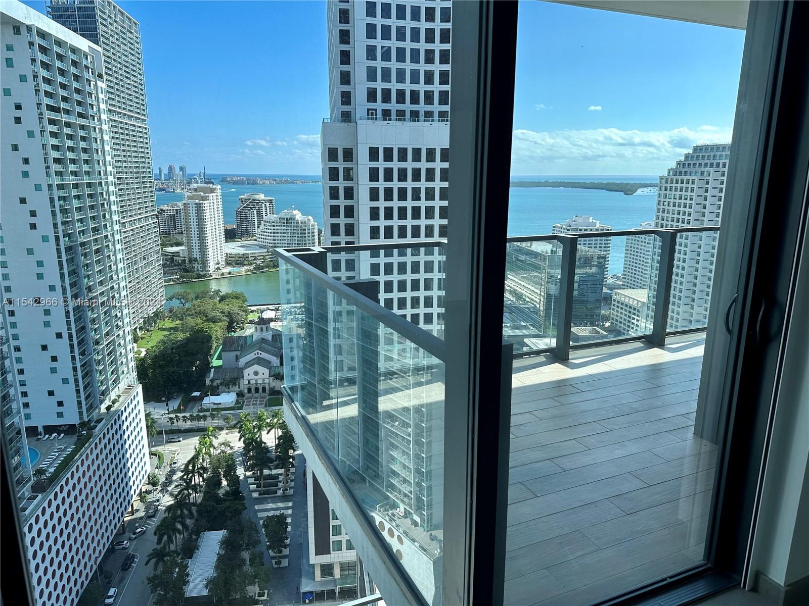 68 Southeast 6th Street, Unit 2707 Miami, FL 33131 - Photo 25 of 53 a picture of city from a balcony