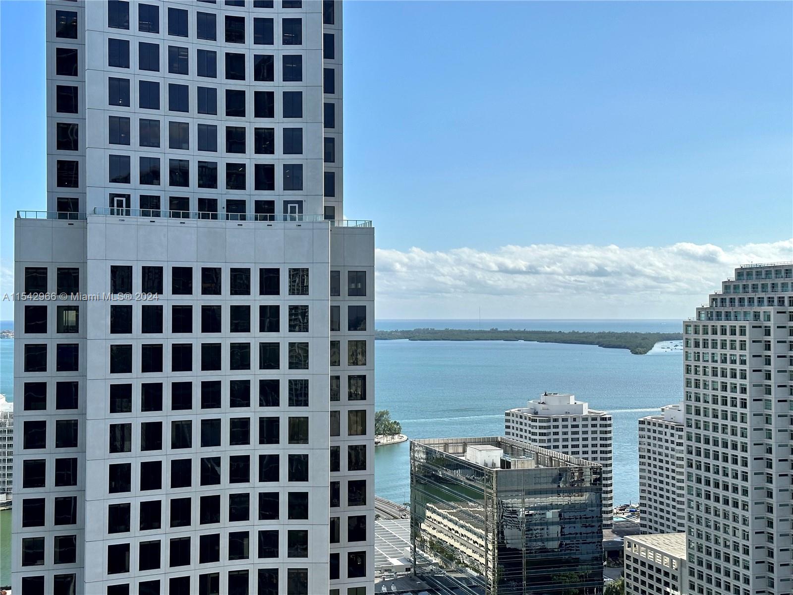 68 Southeast 6th Street, Unit 2707 Miami, FL 33131 - Photo 3 of 53 a view of a city with a building