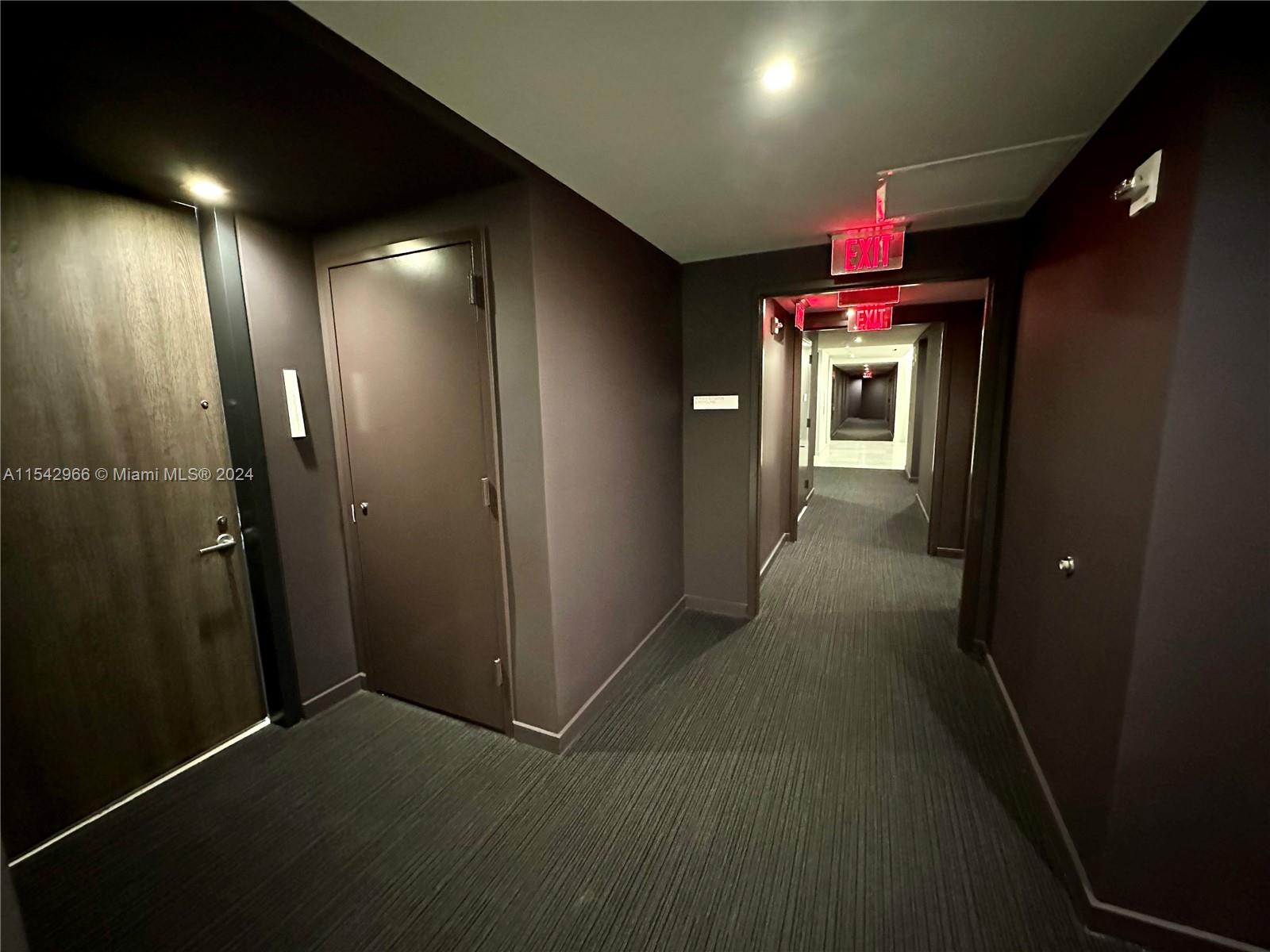68 Southeast 6th Street, Unit 2707 Miami, FL 33131 - Photo 33 of 53 a view of a hallway with two chairs