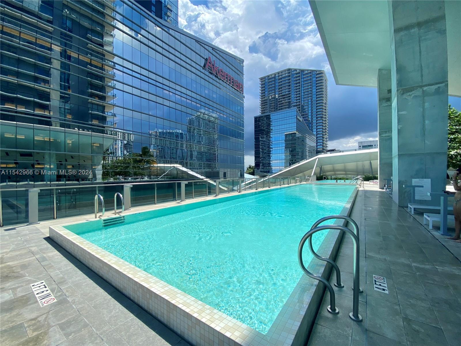 68 Southeast 6th Street, Unit 2707 Miami, FL 33131 - Photo 42 of 53 a view of swimming pool