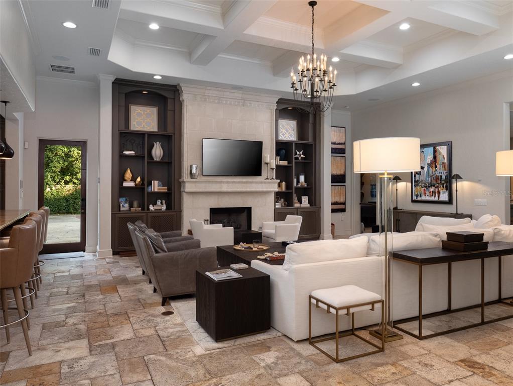10803 Southwest 27 Avenue Gainesville, FL 32608 - Photo 28 of 78 a living room with fireplace furniture and a flat screen tv