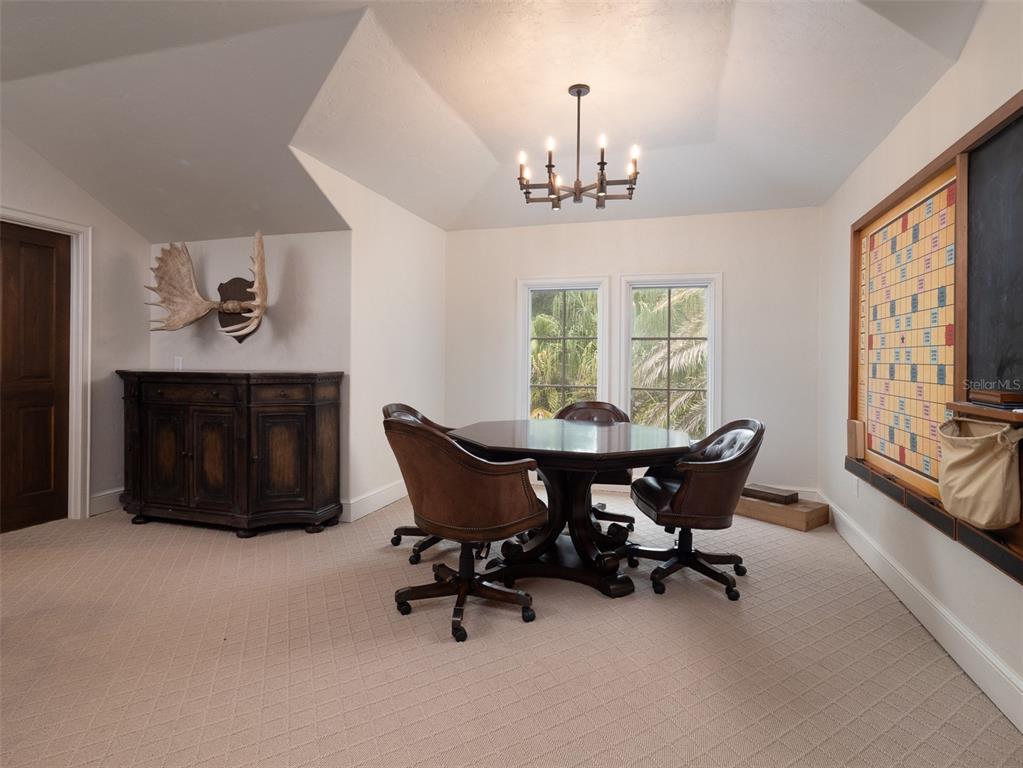 10803 Southwest 27 Avenue Gainesville, FL 32608 - Photo 35 of 78 a view of a dining room with furniture window and outside view