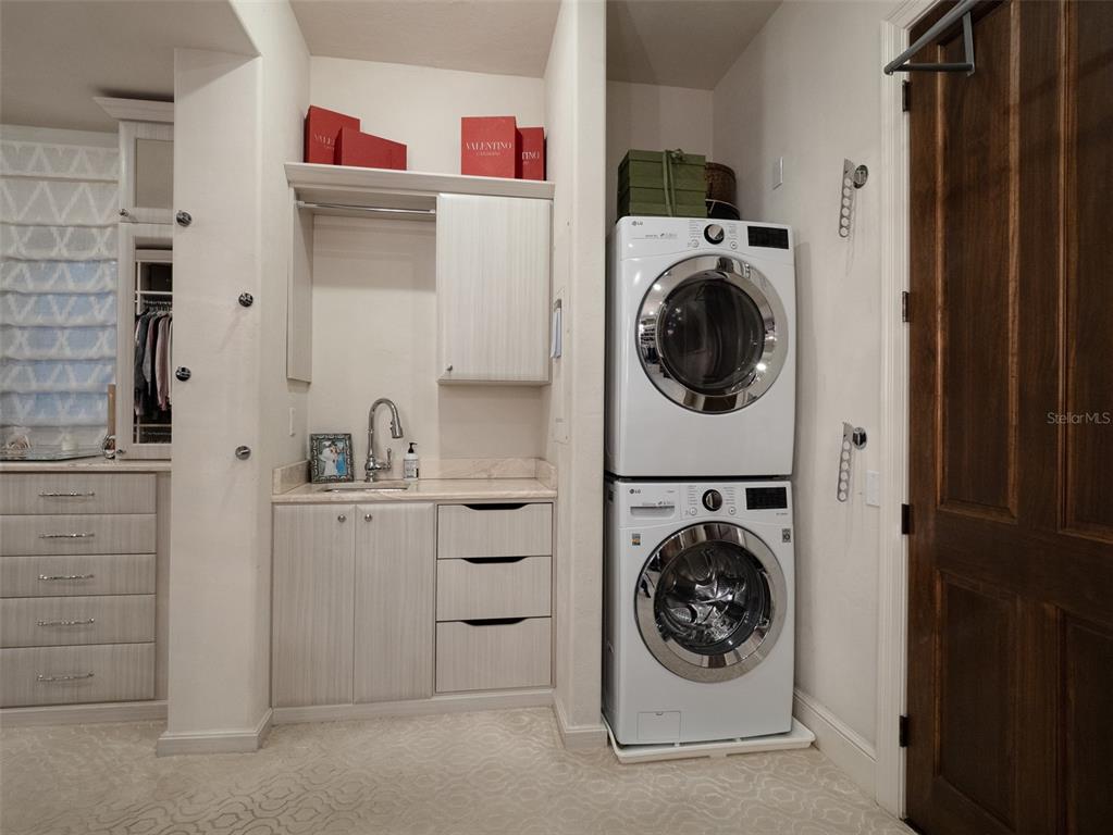 10803 Southwest 27 Avenue Gainesville, FL 32608 - Photo 54 of 78 a utility room with sink dryer and washer