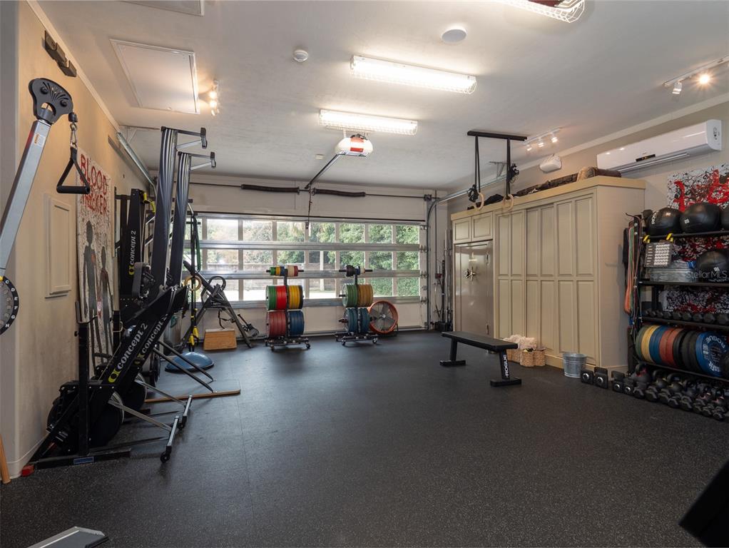10803 Southwest 27 Avenue Gainesville, FL 32608 - Photo 64 of 78 a view of a room with gym equipment