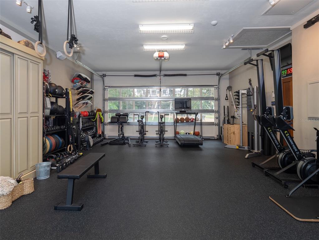 10803 Southwest 27 Avenue Gainesville, FL 32608 - Photo 65 of 78 a view of a room with gym equipment