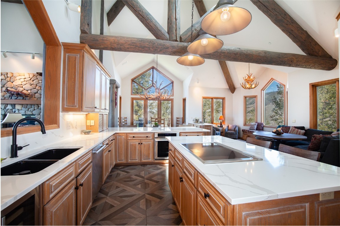 317 High Meadow Drive Dillon, CO 80435 - Photo 11 of 35 a kitchen that has a sink a oven and lots of counter space