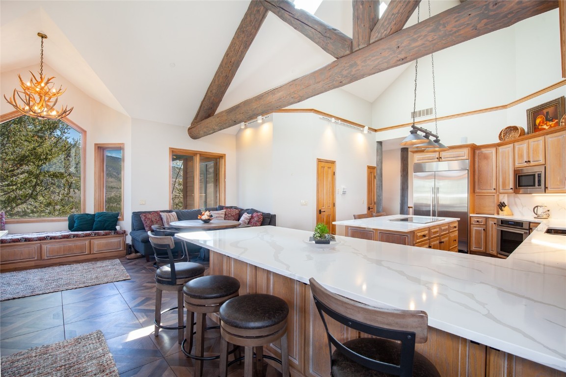 317 High Meadow Drive Dillon, CO 80435 - Photo 12 of 35 a large white kitchen with a large window