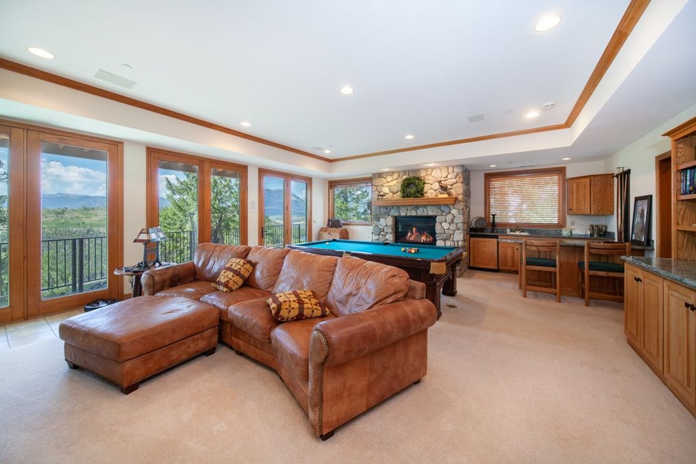 317 High Meadow Drive Dillon, CO 80435 - Photo 18 of 35 a living room with furniture and large windows