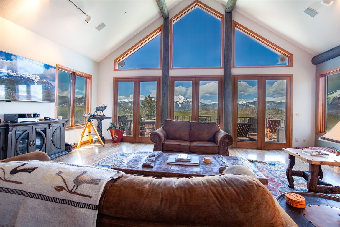 317 High Meadow Drive Dillon, CO 80435 - Photo 2 of 35 a living room with furniture and floor to ceiling windows