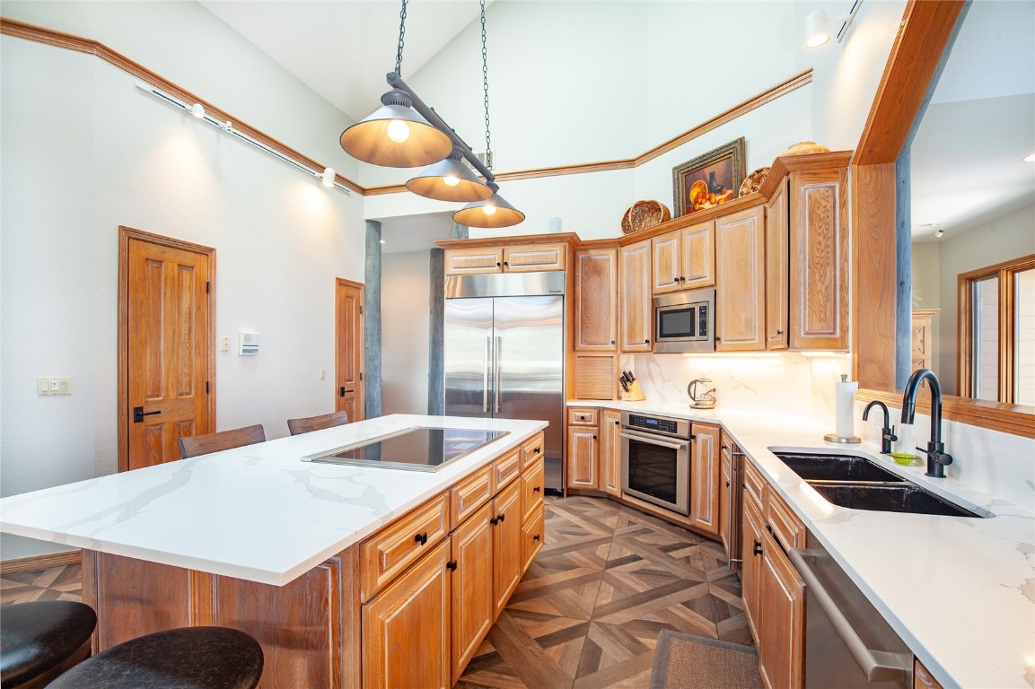317 High Meadow Drive Dillon, CO 80435 - Photo 10 of 35 a kitchen with a sink stove and refrigerator