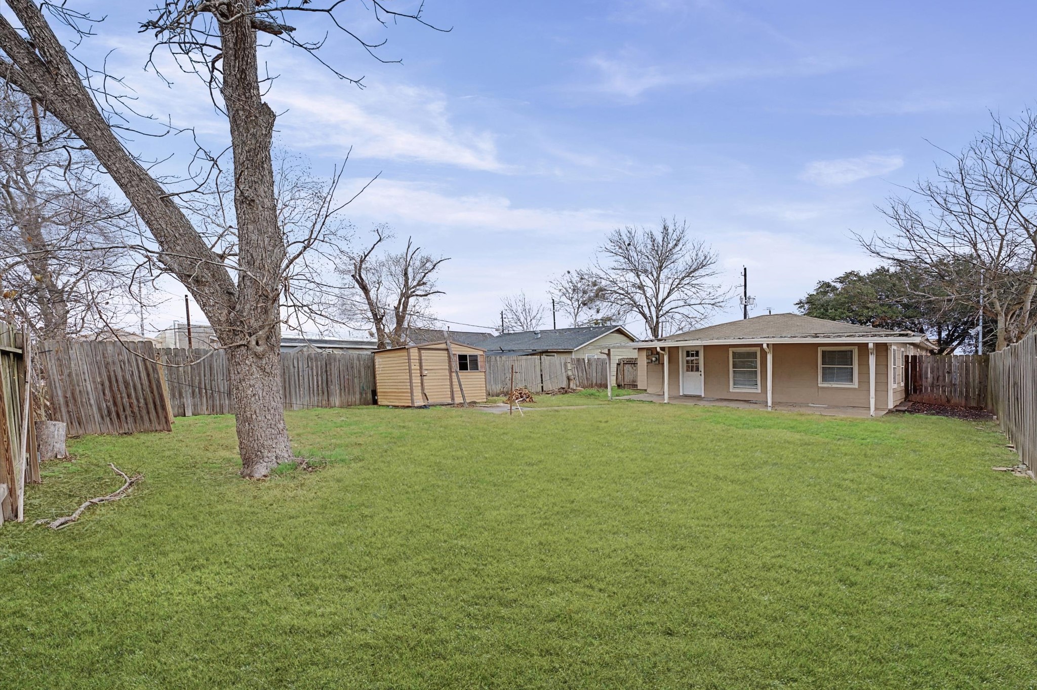 1108 Georgina Street Rosenberg, TX 77471 - Photo 15 of 15 a house with huge green field in front of it
