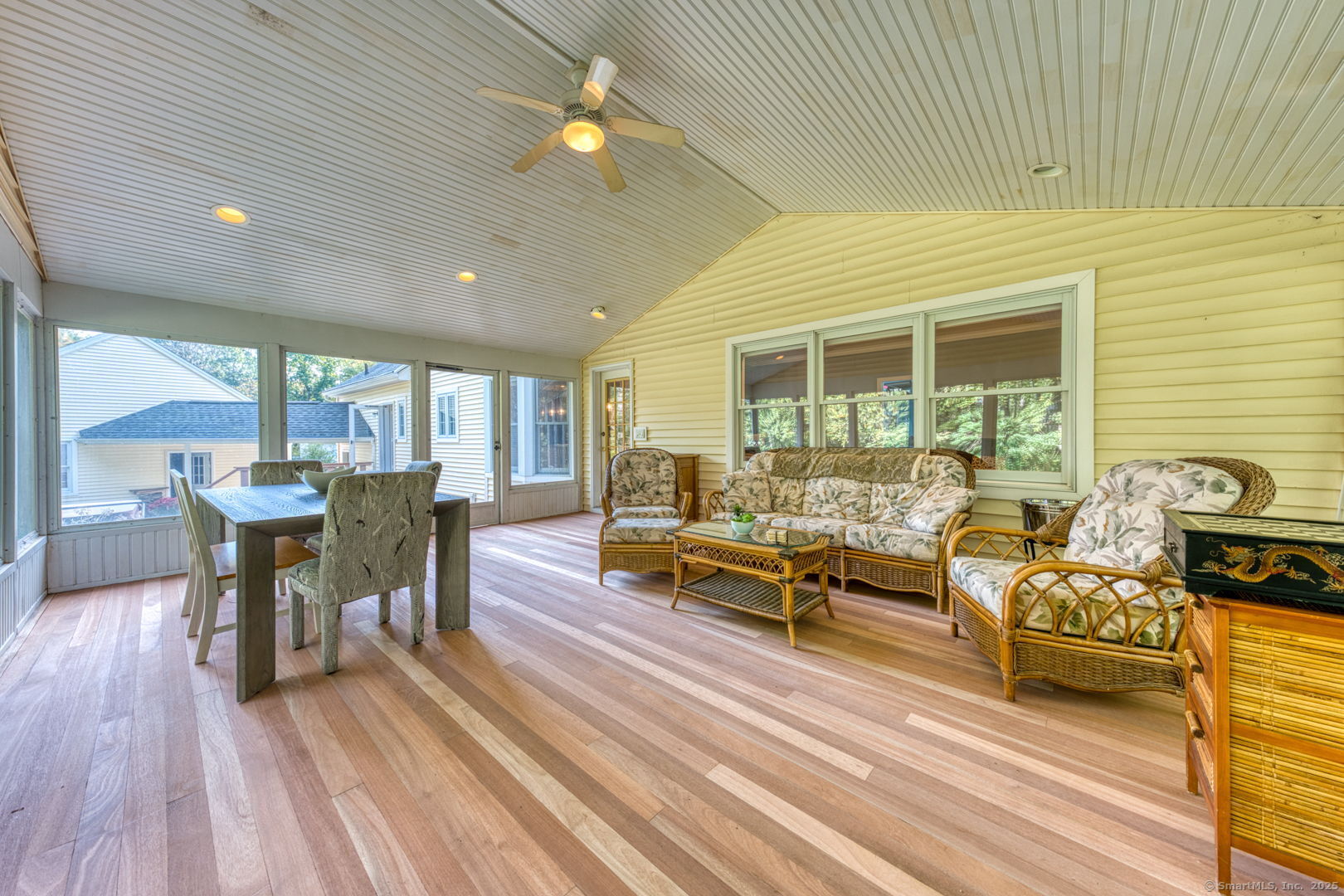 34 Hanover Farms Road Bolton, CT 06043 - Photo 12 of 39 Three season+ room with mahogany floors and vaulted ceilings.