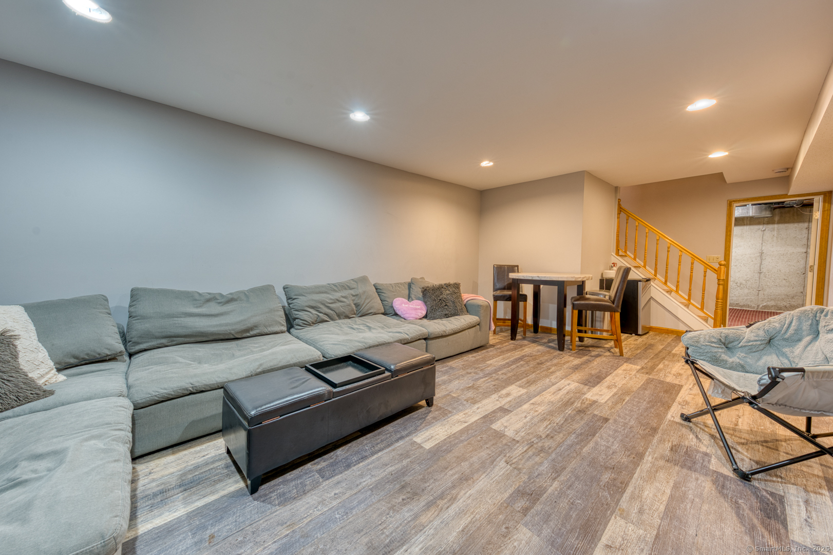 34 Hanover Farms Road Bolton, CT 06043 - Photo 25 of 39 Finished area of the basement. Has a door to a future "wine cellar" if desired.