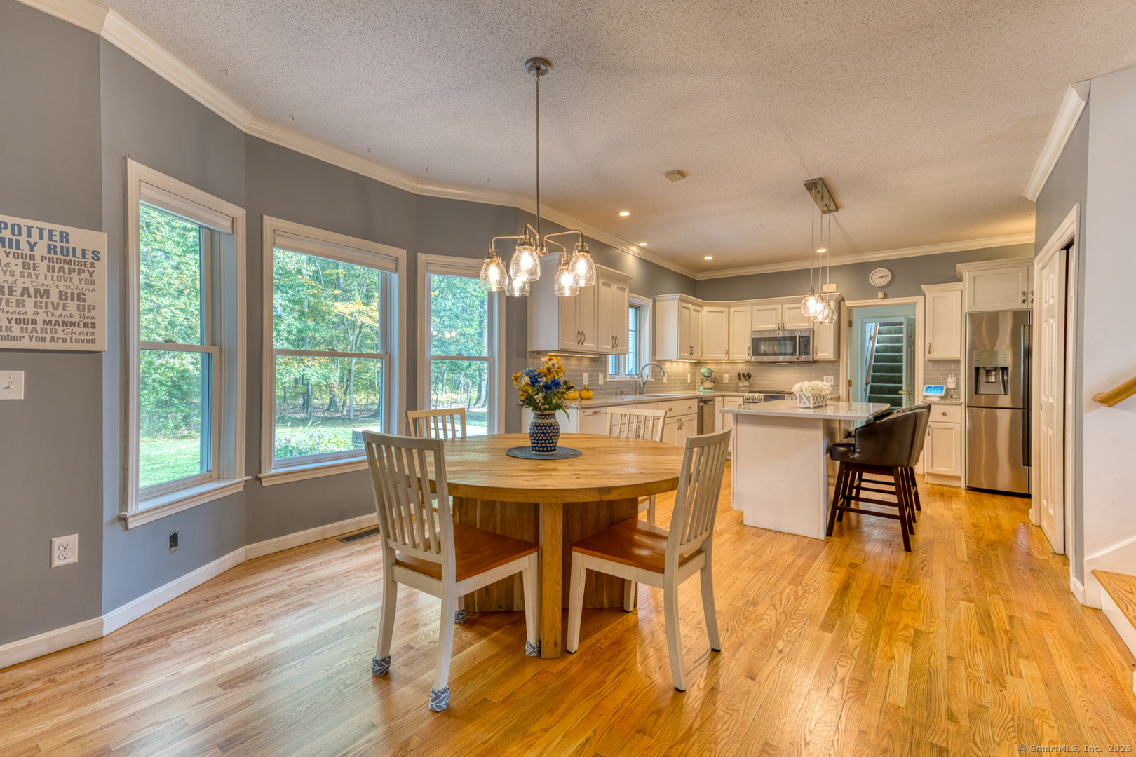 34 Hanover Farms Road Bolton, CT 06043 - Photo 7 of 39 Gorgeous remodeled kitchen open to the cozy LR wih fireplace.