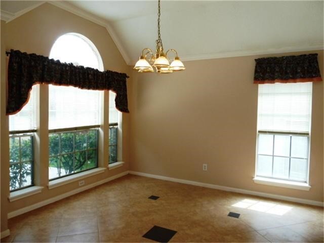 4542 Springfield Lakes Street Sugar Land, TX 77479 - Photo 6 of 16 Bright breakfast nook with large windows and views of the outdoor space.