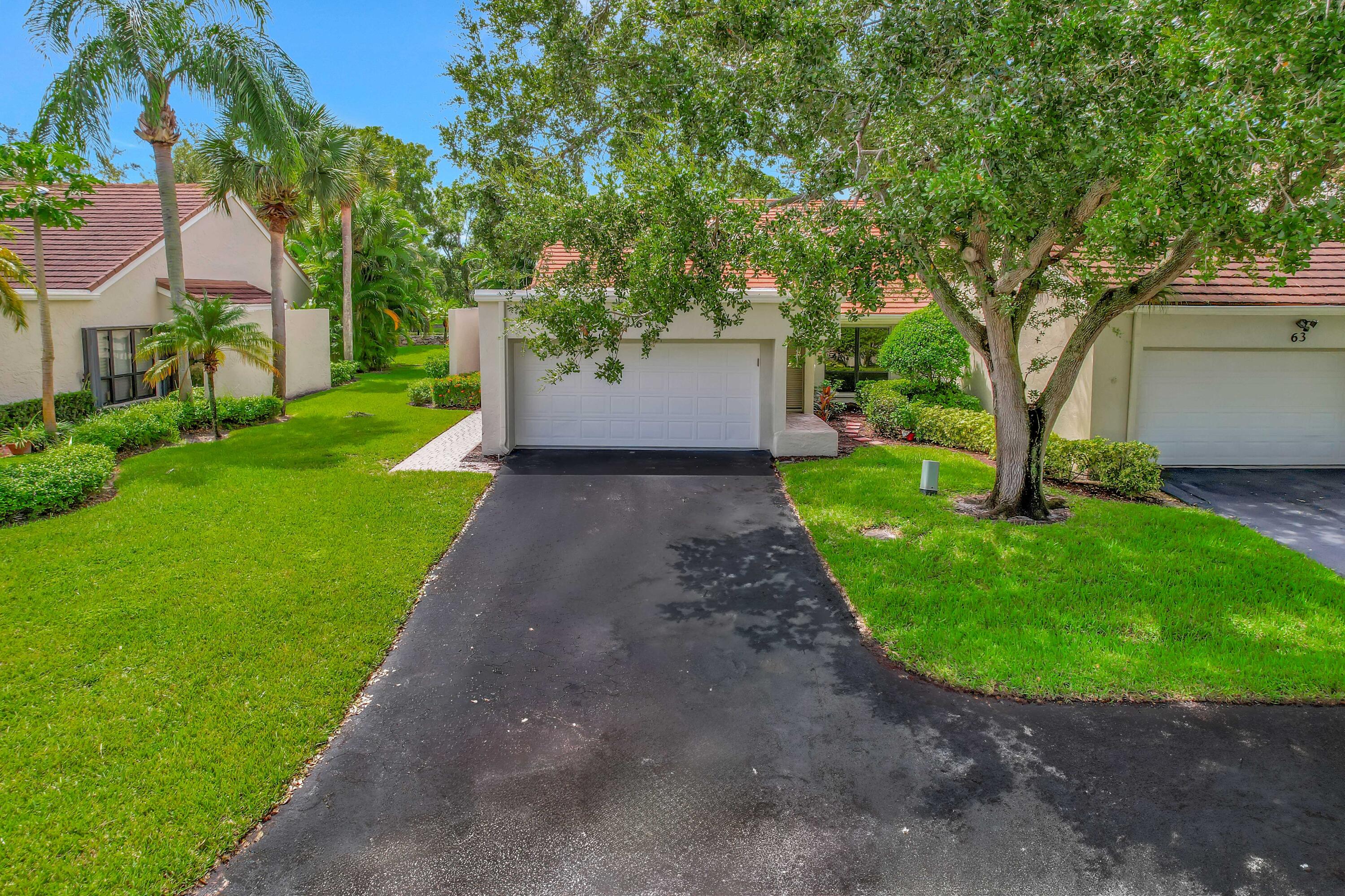 64 Balfour Road East Palm Beach Gardens, FL 33418 - Photo 2 of 31 Extra Parking Driveway