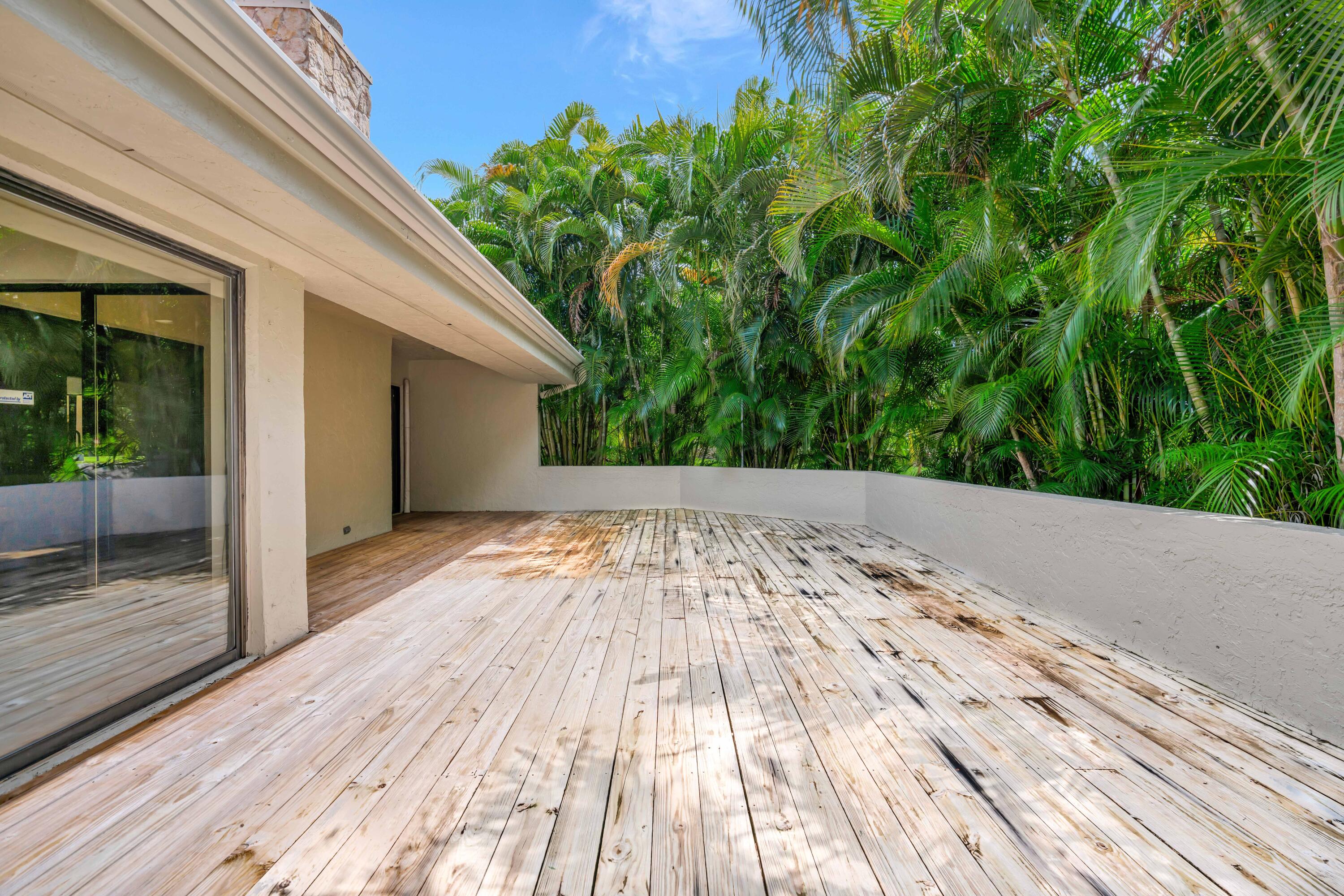 64 Balfour Road East Palm Beach Gardens, FL 33418 - Photo 29 of 31 Wood Rear Deck