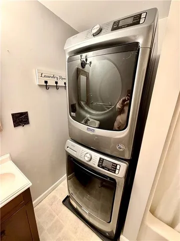 a utility room with dryer and washer