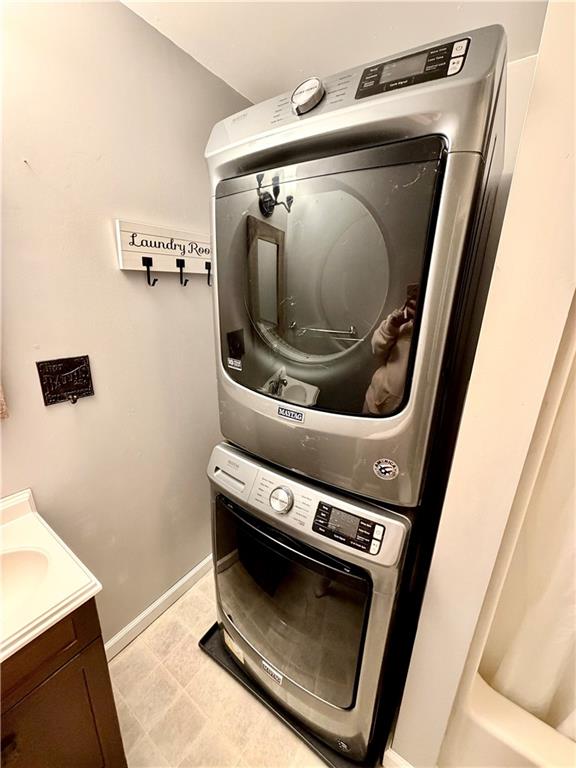 166 Jr Street Hopwood, PA 15445 - Photo 15 of 23 a utility room with dryer and washer