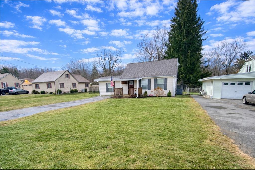 166 Jr Street Hopwood, PA 15445 - Photo 22 of 23 a front view of house with yard and seating area