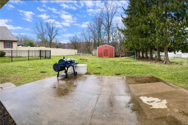 a view of a yard with a slide