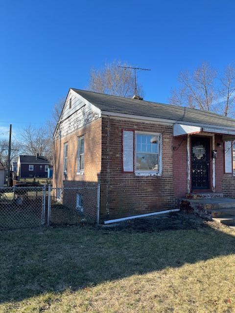 2244 Kentucky Street Gary, IN 46407 - Photo 2 of 9 a view of a house with a yard