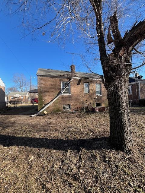 2244 Kentucky Street Gary, IN 46407 - Photo 3 of 9 a room with a table and a chair