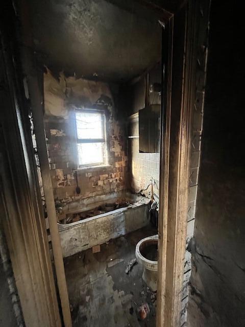 2244 Kentucky Street Gary, IN 46407 - Photo 8 of 9 a bathroom with a bathtub and sink