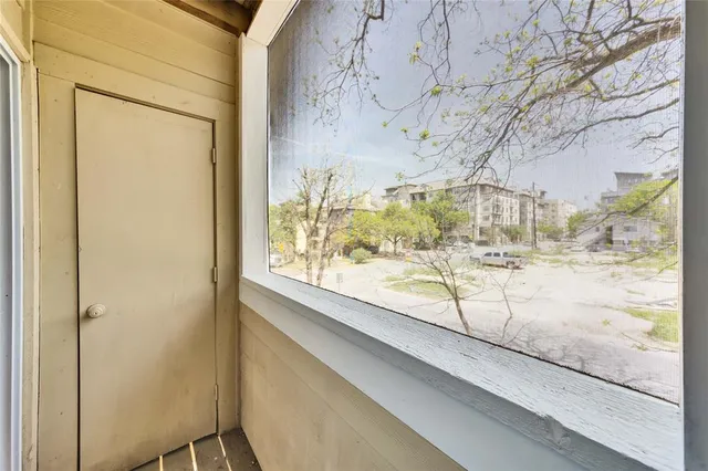 a view of a window with an outdoor space