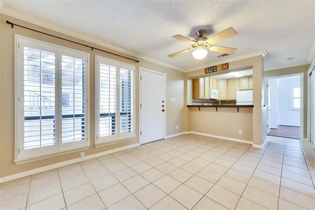 a view of a kitchen with a sink and a window