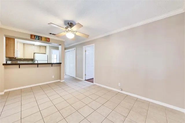 a view of an empty room and window