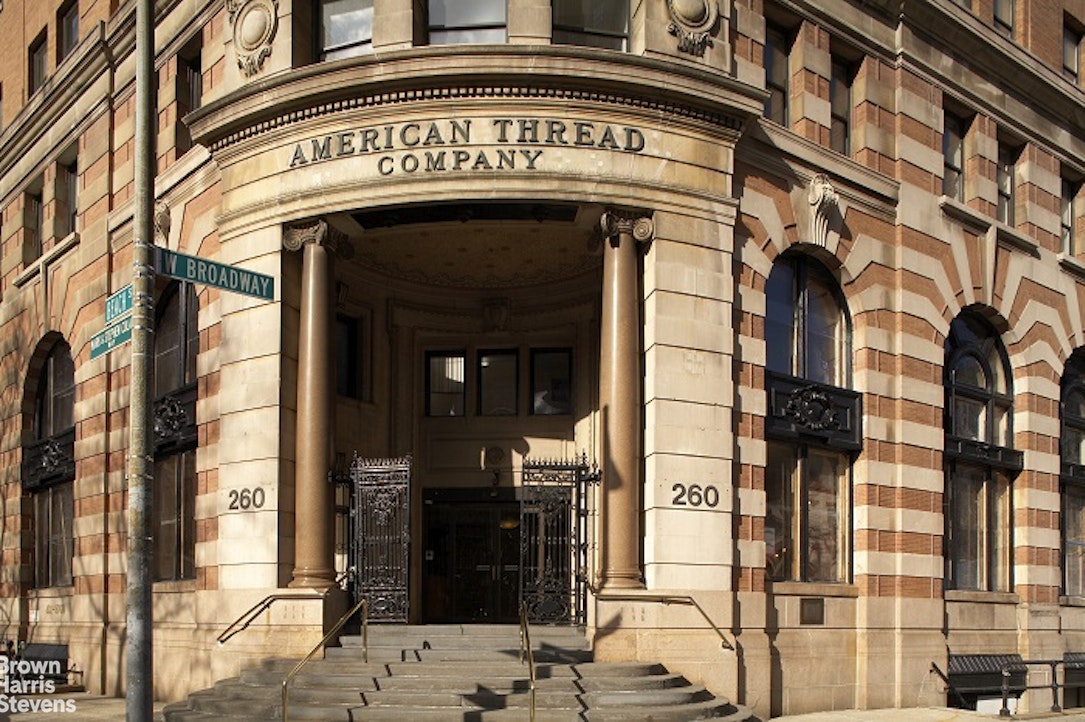 260 West Broadway, Unit 6D Manhattan, NY 10013 - Photo 12 of 15 a view of a building with a street sign