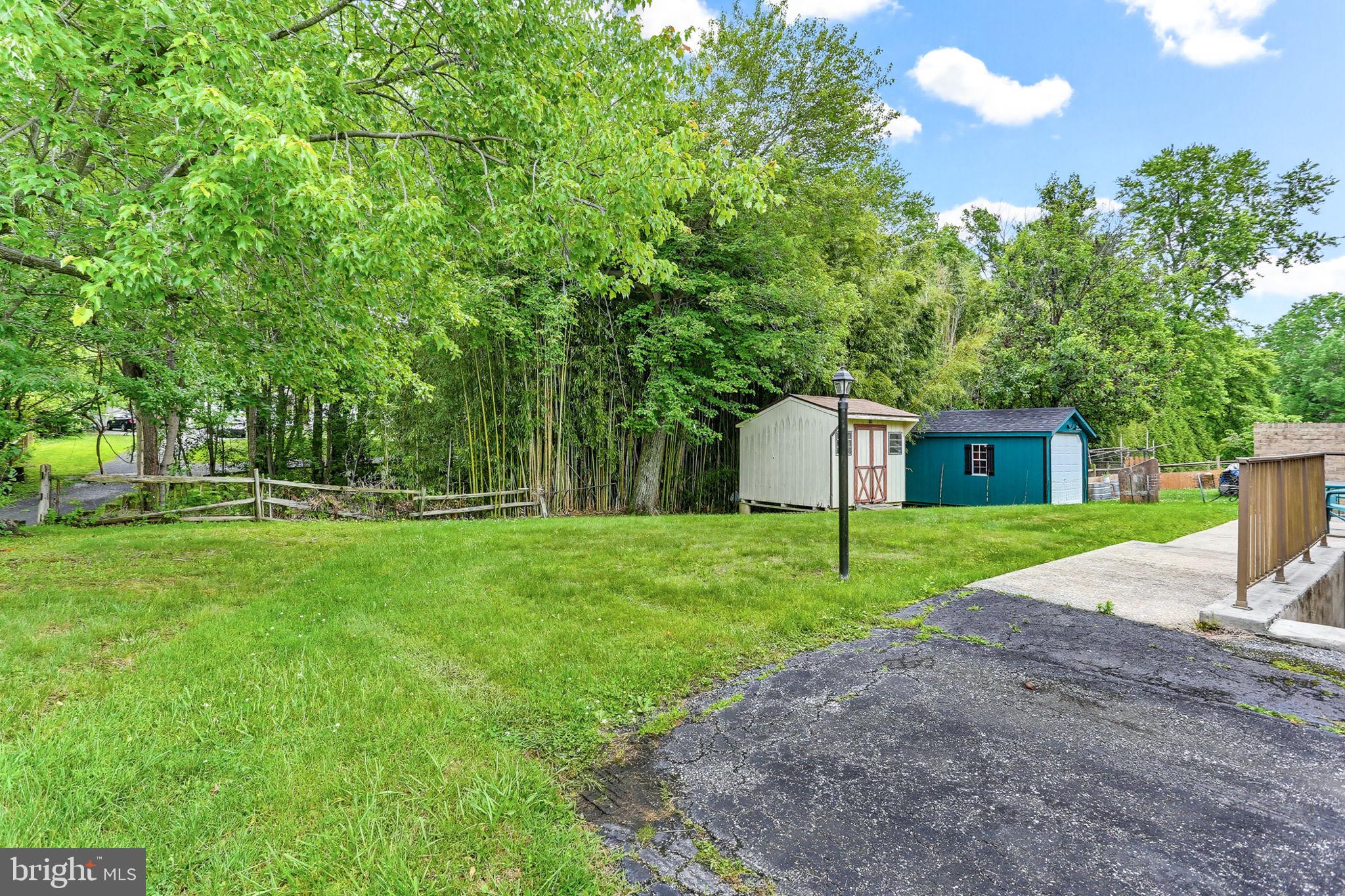 9301 Gardenia Road Baltimore, MD 21236 - Photo 37 of 37 a house view with a sitting space and garden