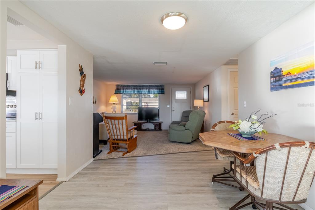 5644 Riddle Road Holiday, FL 34690 - Photo 19 of 58 a living room with furniture and a wooden floor