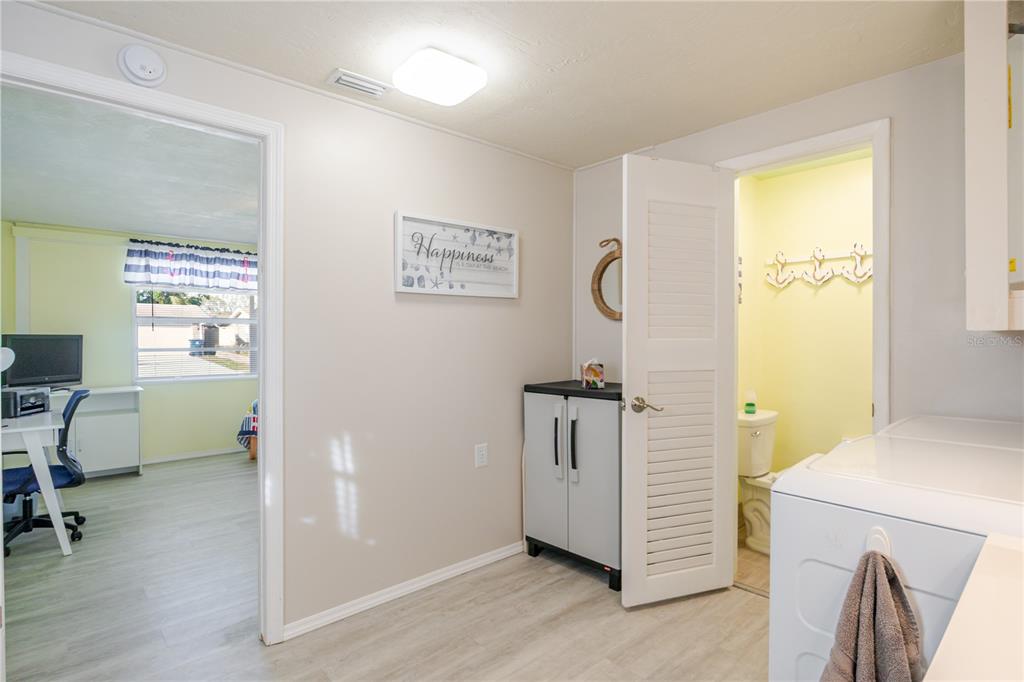 5644 Riddle Road Holiday, FL 34690 - Photo 31 of 58 a view of a hallway with workspace and a window