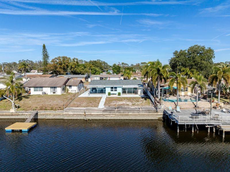 5644 Riddle Road Holiday, FL 34690 - Photo 4 of 58 a view of residential houses with outdoor space and swimming pool