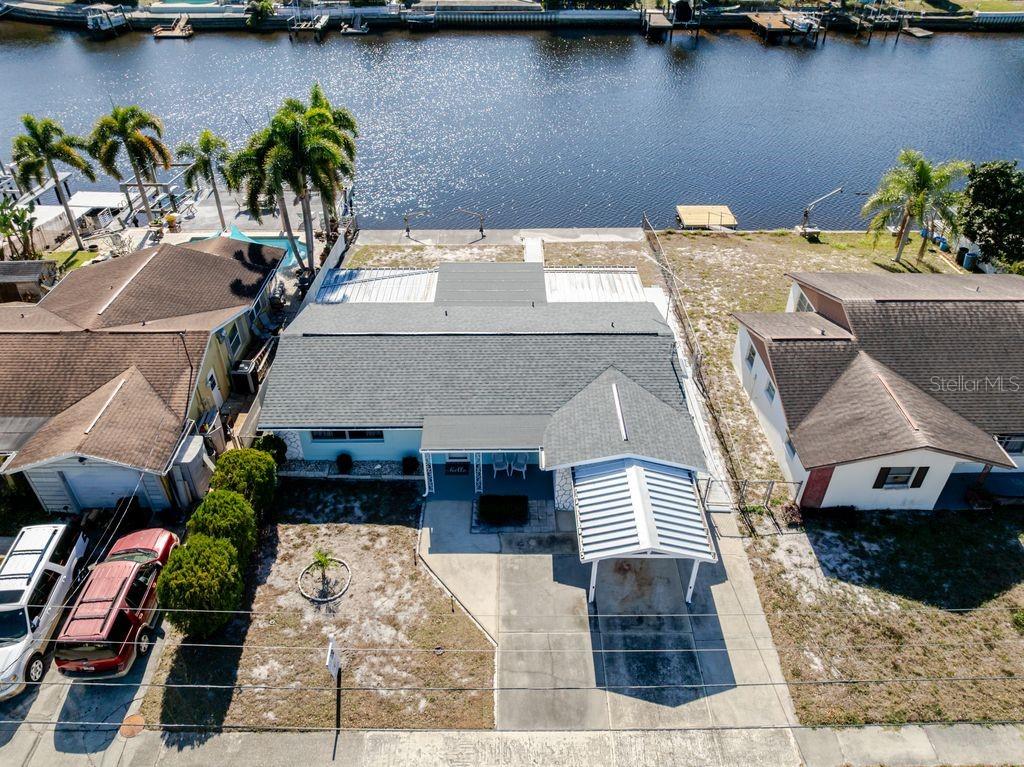 5644 Riddle Road Holiday, FL 34690 - Photo 43 of 58 a picture of a table and chairs in patio