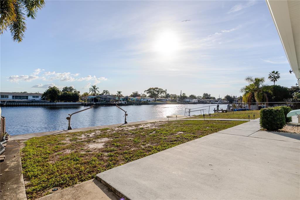 5644 Riddle Road Holiday, FL 34690 - Photo 5 of 58 a view of a lake with a yard