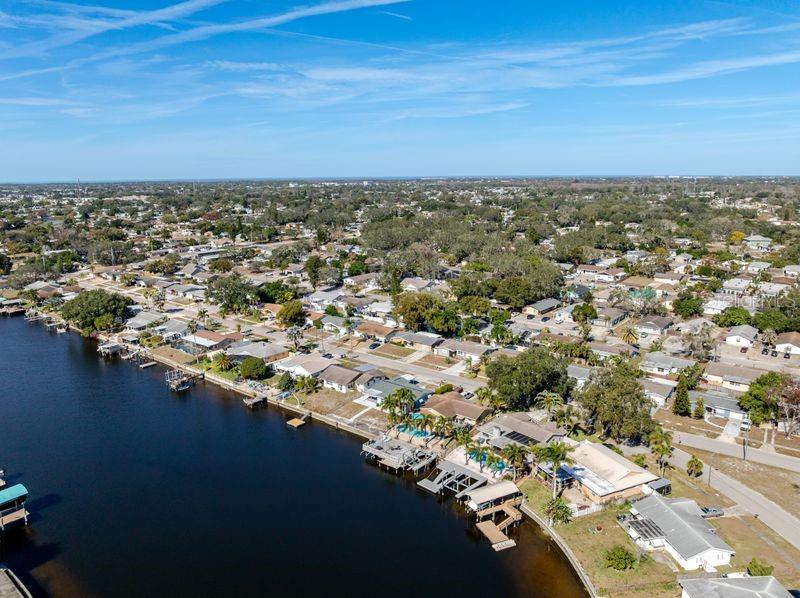 5644 Riddle Road Holiday, FL 34690 - Photo 52 of 58 an aerial view of a city with lots of residential buildings