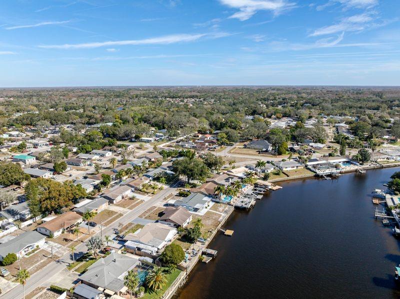 5644 Riddle Road Holiday, FL 34690 - Photo 55 of 58 an aerial view of a city with lots of residential buildings