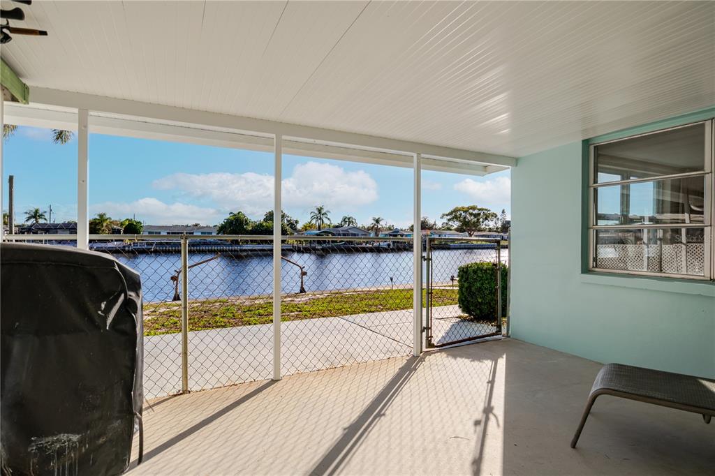 5644 Riddle Road Holiday, FL 34690 - Photo 6 of 58 a view of a living room and kitchen