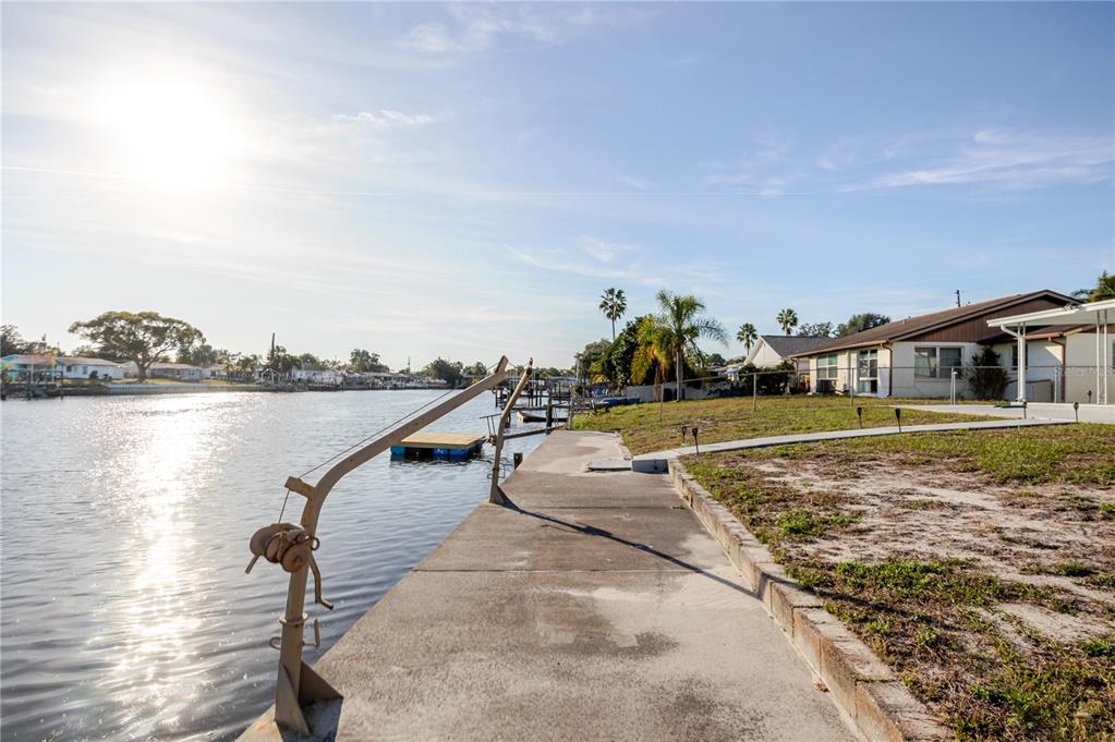 5644 Riddle Road Holiday, FL 34690 - Photo 7 of 58 a view of swimming pool with outdoor seating and plants