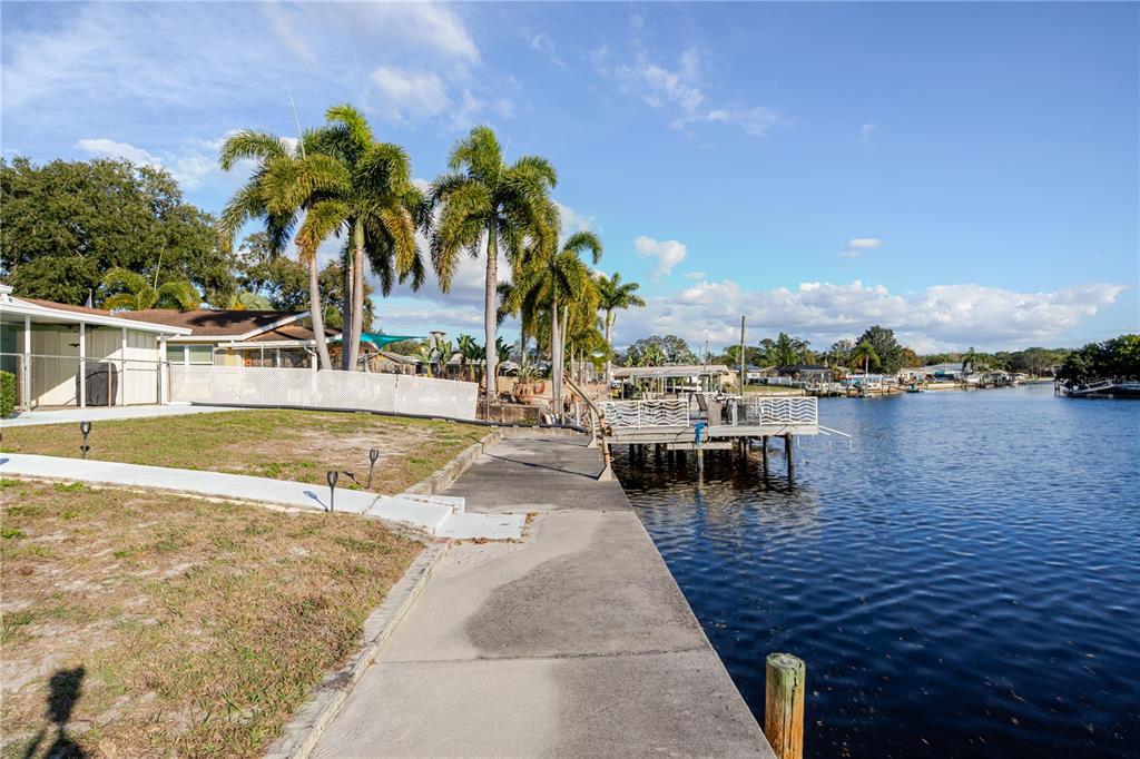5644 Riddle Road Holiday, FL 34690 - Photo 8 of 58 a view of a swimming pool and lake view