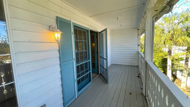 a view of a yard from a balcony
