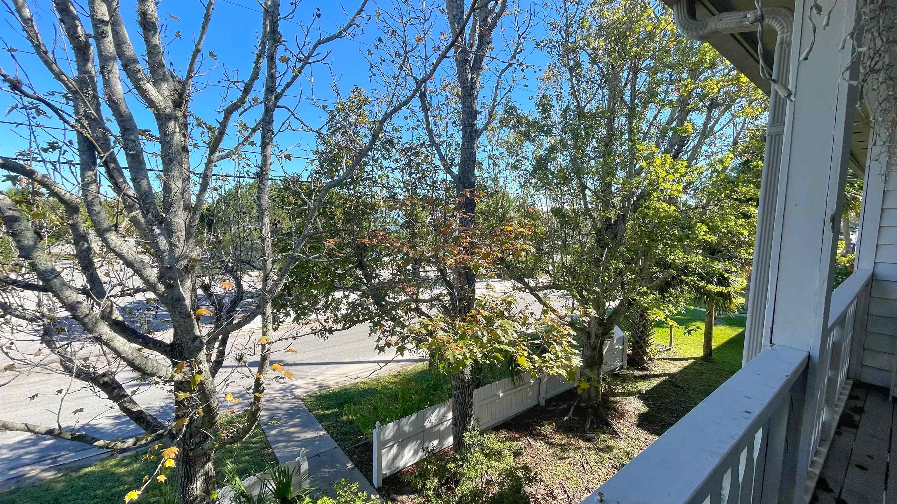 105 Arricola Avenue, Unit E St. Augustine, FL 32080 - Photo 27 of 27 a view of a yard from a balcony