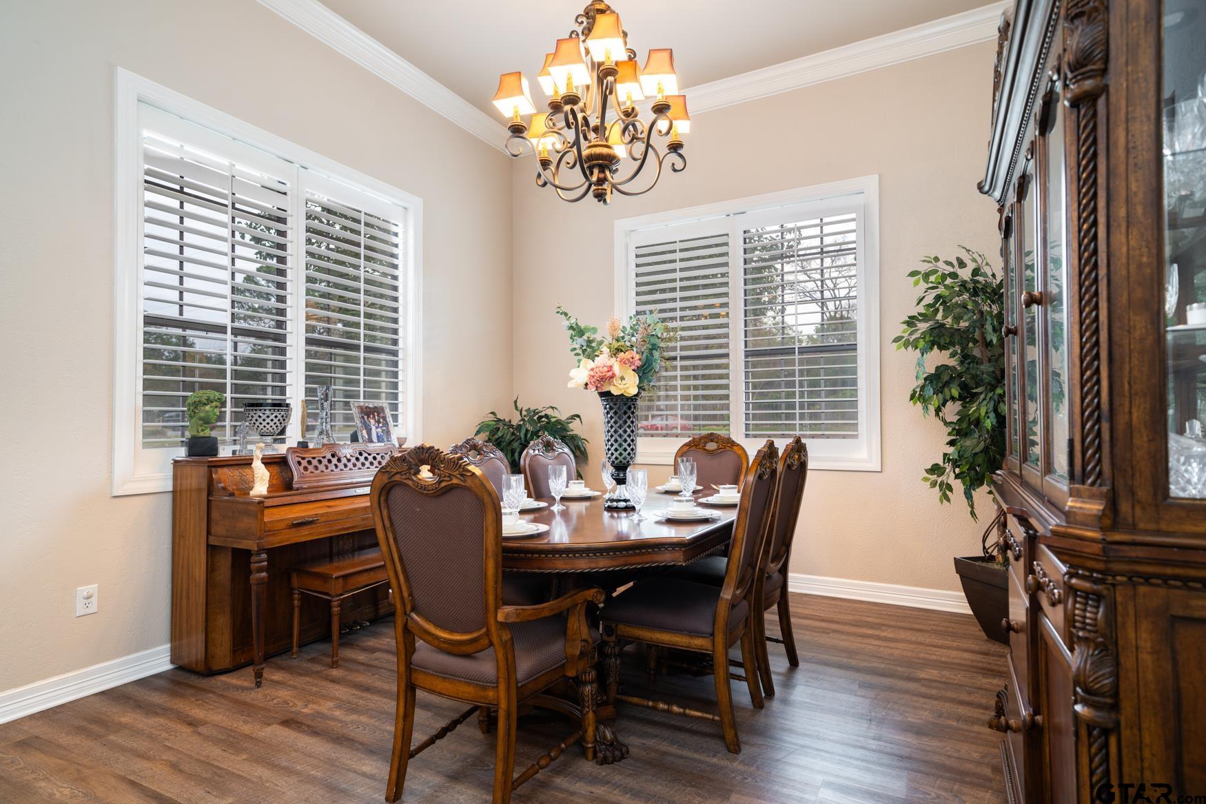 2 Joseph Circle Longview, TX 75601 - Photo 12 of 35 a dining room with furniture window and wooden floor