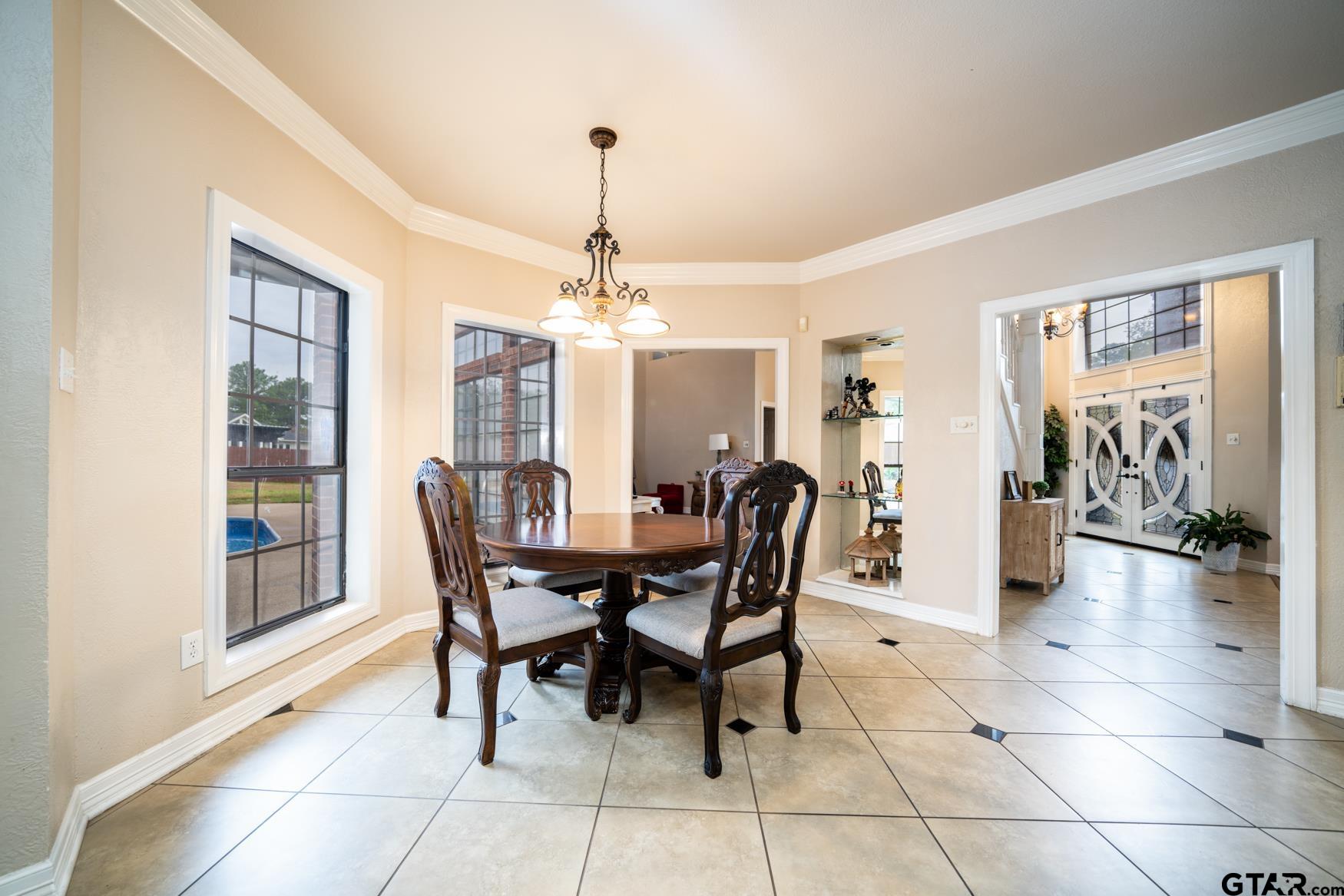 2 Joseph Circle Longview, TX 75601 - Photo 13 of 35 a view of a dining room with furniture and chandelier
