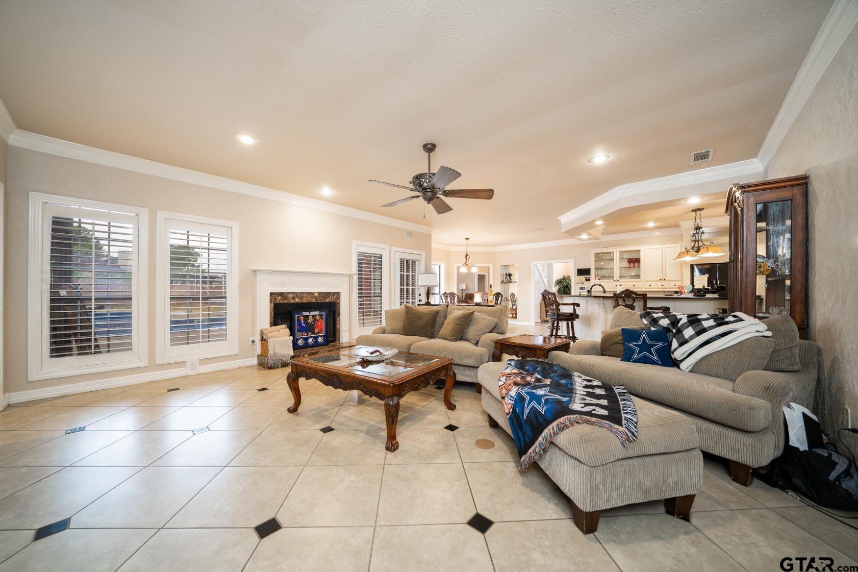 2 Joseph Circle Longview, TX 75601 - Photo 14 of 35 a living room with furniture large window and a fireplace